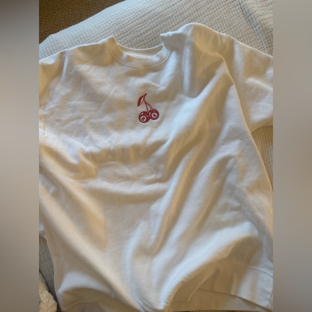 Shop Kristin Jones cherry sweatshirt